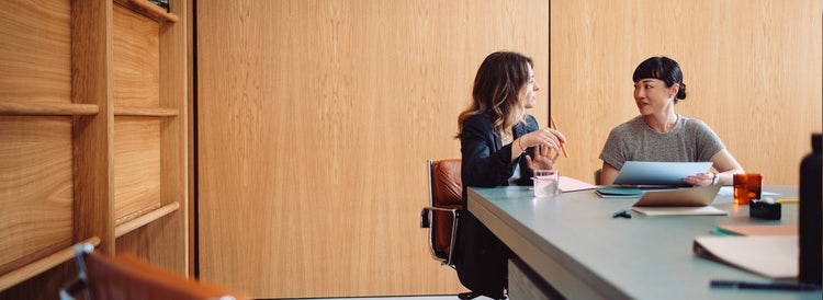 Women discussion in the office